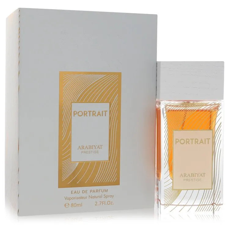 Bottle of Arabiyat Portrait 2.7 Edp L, a luxurious long lasting floral spicy perfume for women with cinnamon, apple, orange blossom, amber, and musk notes