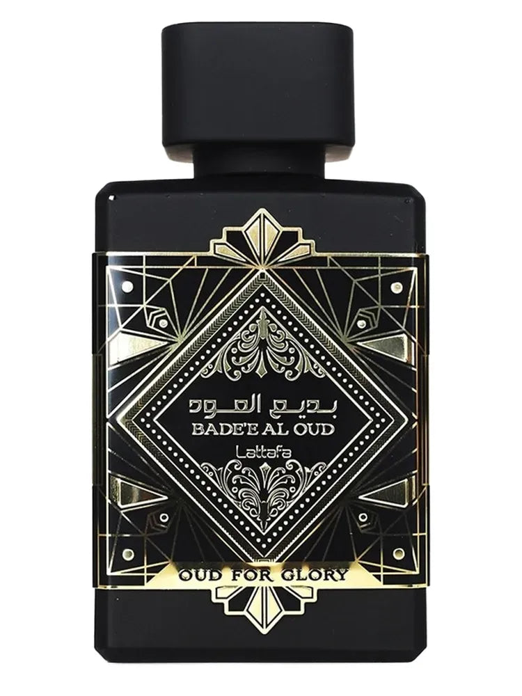 Black perfume bottle with gold and white geometric design on a white background